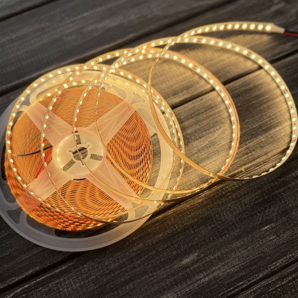 Лента 24В светодиодная 120д.м. 9Вт SMD led 2835 IP20 3000К теплый белый свет 10м (цена 1м) 25178 фото